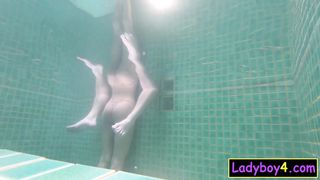 Pretty Asian shemale Prem POV blowjob in a pool with underwater shots