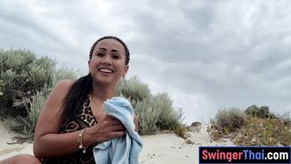 Huge tits Thai MILF public masturbation on a beach in Thailand