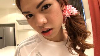 Asian ladyboy teen Kitty in a football uniform anal stuffed
