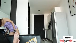 Skinny amateur Thai asian teen Nok waxing her boyfriends big white cock