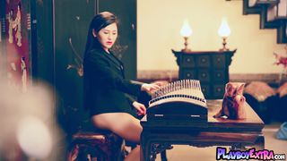 Passionate all natural Chinese teen Wu Muxi reveals her hairy asian pussy