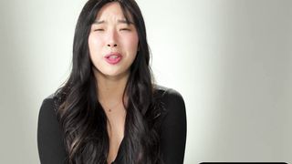 Petite sexy Asian babe flaunts perky tits and fingers hairy pussy