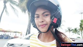 Cute Thai teen amateur takes a big white cock in her petite pussy